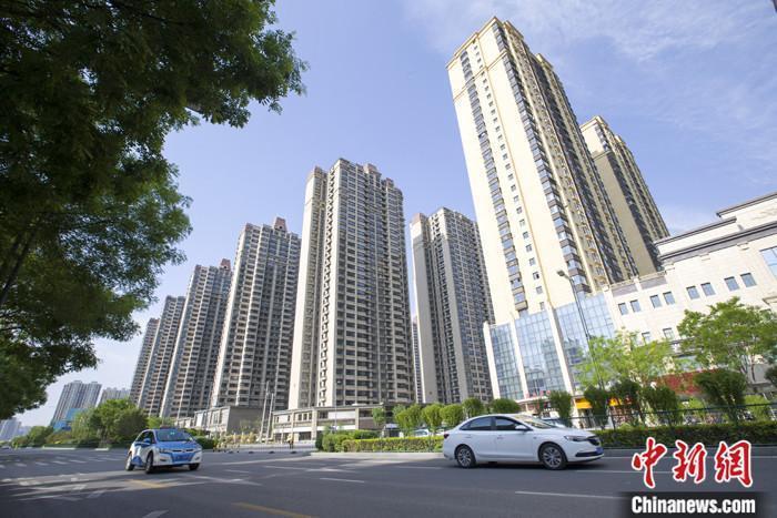 資料圖：車輛從一樓盤前經(jīng)過。 <a target='_blank' href='/'><p  align=